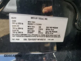 2022 Tesla Model Y Performance with VIN 7SAYGDEF1NF486218, listed as a Copart auction lot 63127435 with 99,302 mi miles and Salvage title. Bid and sale history available at DreamBid. Image 12.
