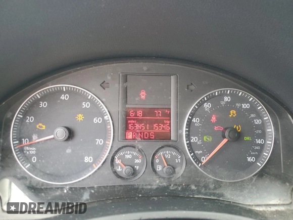 2009 Volkswagen Jetta SE z VIN 3VWRM71K49M055000, wystawiony jako Copart lot #54450045 z przebiegiem 163 451 mil mil oraz Szkoda całkowita • Salvage title. Historia ofert i sprzedaży dostępna na DreamBid. Obrazek 9.