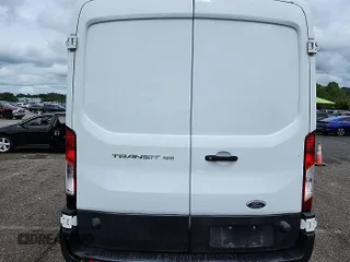 2020 Ford Transit Cargo z VIN 1FTYE1C89LKA17335, wystawiony jako IAAI lot #42561511 z przebiegiem 276 728 mil mil oraz . Historia ofert i sprzedaży dostępna na DreamBid. Obrazek 20.