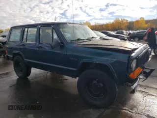 1996 Jeep Cherokee SE z VIN 1J4FJ28S6TL184205, wystawiony jako Copart lot #77558034 z przebiegiem 195 000 mil mil oraz Tytuł czysty. Historia ofert i sprzedaży dostępna na DreamBid. Obrazek 4.
