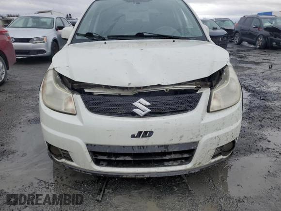 2009 Suzuki SX4 Man AWD with VIN JS2YB413896205143, listed as a Copart auction lot 48489255 with 127,403 mi miles and Salvage Title. Bid and sale history available at carsss.com. Image 12.