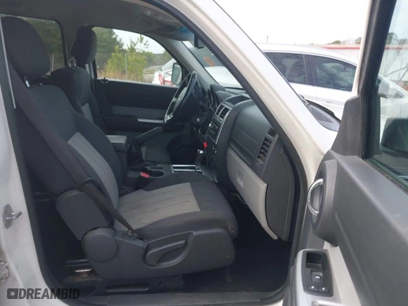 2010 Dodge Nitro SXT with VIN 1D4PU5GK7AW138708, listed as a IAAI auction lot 41440363 with 244,810 mi miles. Bid and sale history available at carsss.com. Image 5.