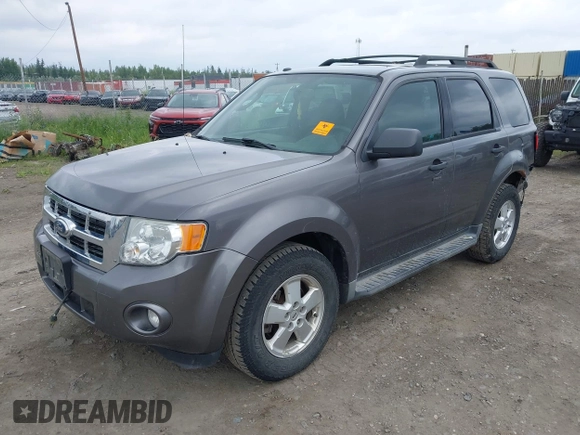 2011 Ford Escape XLT z VIN 1FMCU9D73BKA87277, wystawiony jako IAAI lot #42662242 z przebiegiem 207 649 mil mil oraz . Historia ofert i sprzedaży dostępna na DreamBid. Obrazek 2.