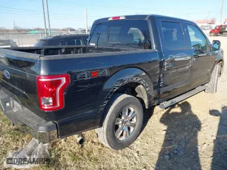 2015 Ford F-150 XLT with VIN 1FTEW1EG3FFC90398, listed as a IAAI auction lot 41665025 with 159,480 mi miles. Bid and sale history available at carsss.com. Image 4.