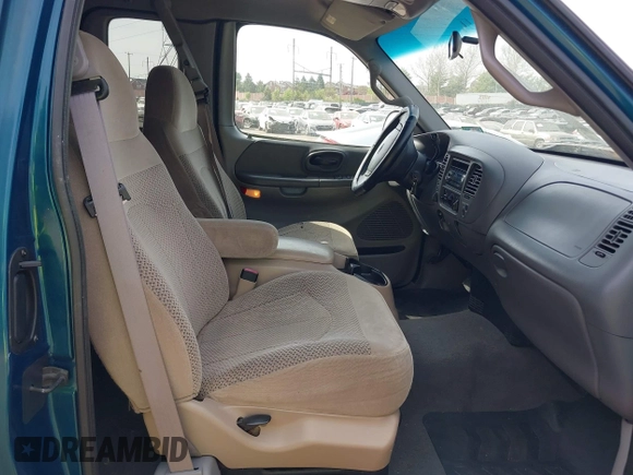 2000 Ford F-150 XL with VIN 1FTRX18W2YNC19493, listed as a IAAI auction lot 42127210 with 115,052 mi miles. Bid and sale history available at carsss.com. Image 5.