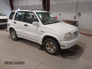 2000 Suzuki Grand Vitara JLX z VIN JS3TD62V1Y4119064, wystawiony jako IAAI lot #40845963 z przebiegiem 339 219 mil mil oraz . Historia ofert i sprzedaży dostępna na DreamBid. Obrazek 1.