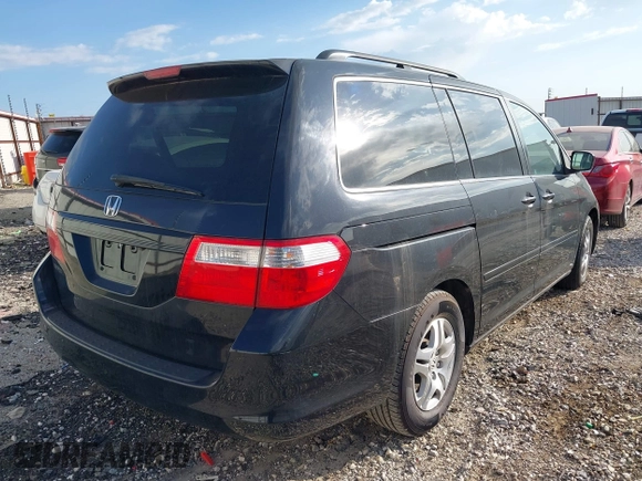 2007 Honda Odyssey EX-L with VIN 5FNRL38767B139398, listed as a IAAI auction lot 42044526 with 191,041 mi miles. Bid and sale history available at carsss.com. Image 4.