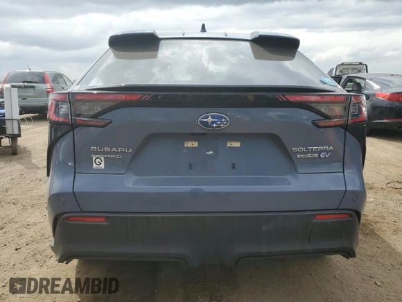 2023 Subaru Solterra Limited with VIN JTMABABA4PA031170, listed as a Copart auction lot 54517985 with 53,221 mi miles and Salvage title. Bid and sale history available at DreamBid. Image 6.