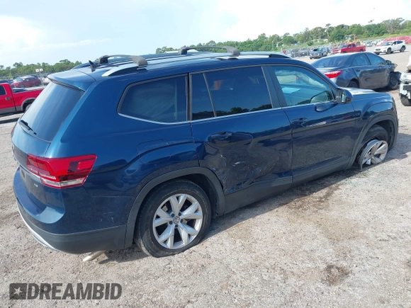 2018 Volkswagen Atlas SE with VIN 1V2CR2CA1JC561003, listed as a IAAI auction lot 42556798 with 124,147 mi miles and . Bid and sale history available at DreamBid. Image 4.