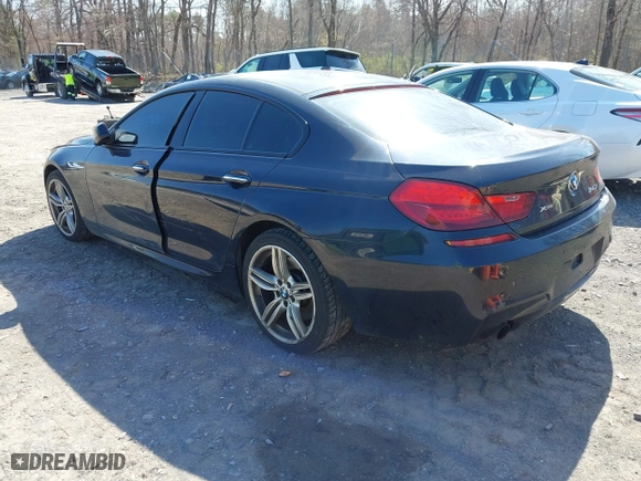 2014 BMW 6 Series 640i xDrive with VIN WBA6B8C58EDZ72405, listed as a IAAI auction lot 42076517 with 101,704 mi miles. Bid and sale history available at carsss.com. Image 3.