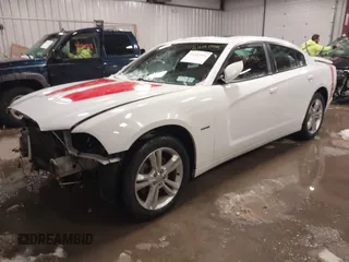 2011 Dodge Charger RT Plus with VIN 2B3CM5CT1BH555608, listed as a IAAI auction lot 41491944 with 140,081 mi miles. Bid and sale history available at carsss.com. Image 2.