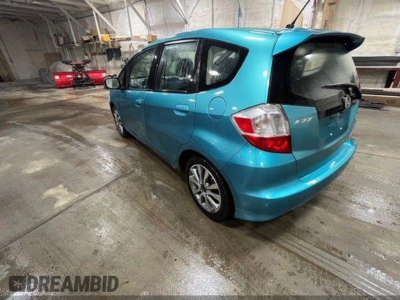2013 Honda Fit Sport with VIN JHMGE8H58DC044846, listed as a IAAI auction lot 42201605 with 198,546 mi miles. Bid and sale history available at carsss.com. Image 3.