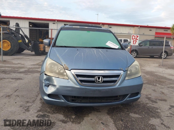 2007 Honda Odyssey EX-L z VIN 5FNRL38717B035384, wystawiony jako IAAI lot #41976861 z przebiegiem 211 640 mil mil oraz . Historia ofert i sprzedaży dostępna na DreamBid. Obrazek 12.