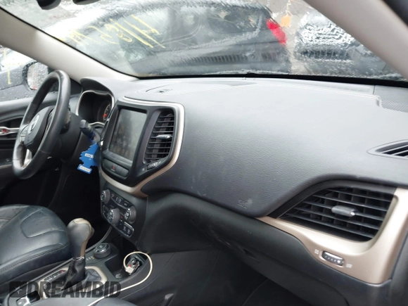 2015 Jeep Cherokee Limited with VIN 1C4PJMDS2FW523010, listed as a IAAI auction lot 41857999 with 162,625 mi miles and . Bid and sale history available at DreamBid. Image 5.