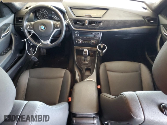 2014 BMW X1 sDrive28i z VIN WBAVM1C57EVW50653, wystawiony jako Copart lot #57309385 z przebiegiem Nie podano mil oraz Szkoda całkowita • Salvage title. Historia ofert i sprzedaży dostępna na DreamBid. Obrazek 8.