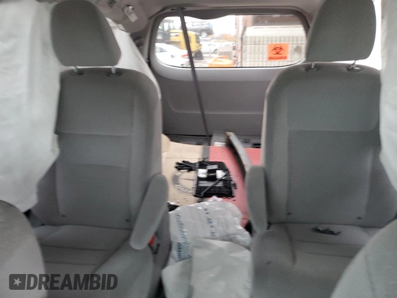 2020 Toyota Sienna LE z VIN 5TDJZ3DC2LS246596, wystawiony jako Copart lot #82495544 z przebiegiem Nie podano mil oraz Szkoda całkowita • Salvage title. Historia ofert i sprzedaży dostępna na DreamBid. Obrazek 10.