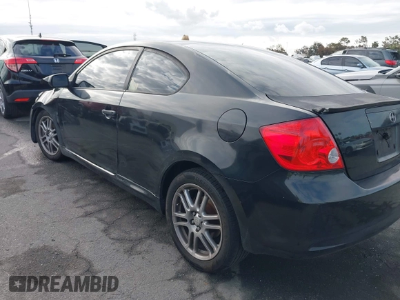 2007 Scion tC Spec with VIN JTKDE167070155986, listed as a IAAI auction lot 42062910 with 198,049 mi miles. Bid and sale history available at carsss.com. Image 14.