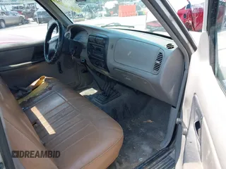 1996 Ford Ranger XL with VIN 1FTCR10A2TUC69535, listed as a IAAI auction lot 42454127 with 97,479 mi miles and . Bid and sale history available at DreamBid. Image 5.