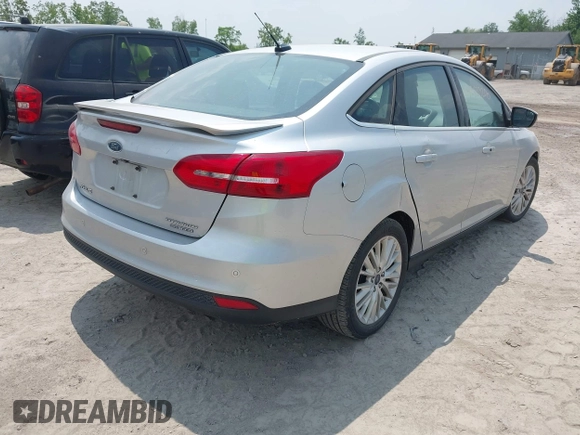 2015 Ford Focus Titanium с VIN 1FADP3J24FL280341, выставлен на аукционе IAAI как лот 42433208 с пробегом 151 813 миль миль и . История ставок и продаж доступна на DreamBid. Изображение 4.