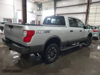 2017 Nissan Titan XD PRO-4X with VIN 1N6BA1F42HN515535, listed as a IAAI auction lot 41770534 with 73,733 mi miles. Bid and sale history available at carsss.com. Image 4.