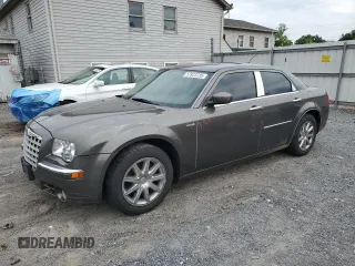 2008 Chrysler 300 Limited with VIN 2C3KA33GX8H140066, listed as a Copart auction lot 57823735 with 105,617 mi miles and Salvage title. Bid and sale history available at DreamBid. Image 1.