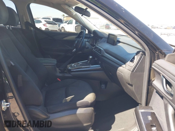 2018 Mazda CX-9 Sport with VIN JM3TCABY8J0223750, listed as a IAAI auction lot 42155429 with 133,543 mi miles and . Bid and sale history available at DreamBid. Image 5.