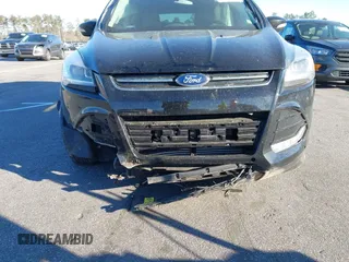 2016 Ford Escape Titanium with VIN 1FMCU0JX3GUA90420, listed as a IAAI auction lot 41850537 with 115,770 mi miles. Bid and sale history available at carsss.com. Image 6.