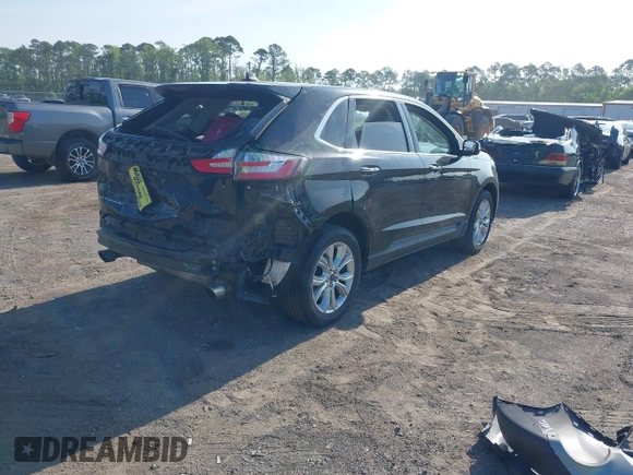 2022 Ford Edge Titanium with VIN 2FMPK4K99NBA45354, listed as a IAAI auction lot 42187761 with 75,458 mi miles and . Bid and sale history available at DreamBid. Image 4.