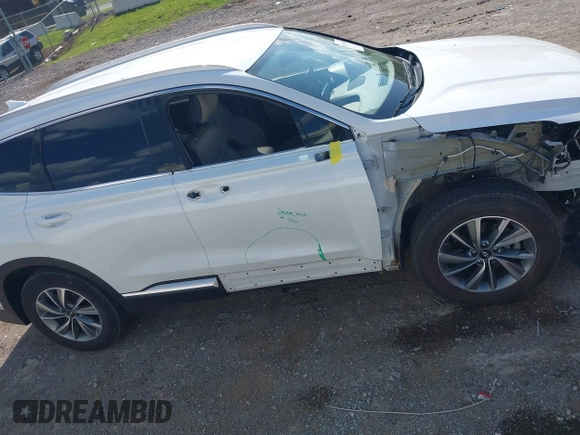 2020 Hyundai Santa Fe SEL with VIN 5NMS3CAD0LH254203, listed as a IAAI auction lot 42119602 with 104,158 mi miles. Bid and sale history available at carsss.com. Image 14.