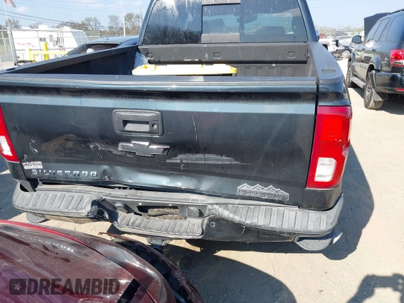 2018 Chevrolet Silverado 1500 High Country with VIN 3GCUKTEC8JG308353, listed as a IAAI auction lot 40714183 with 88,711 mi miles and . Bid and sale history available at DreamBid. Image 16.