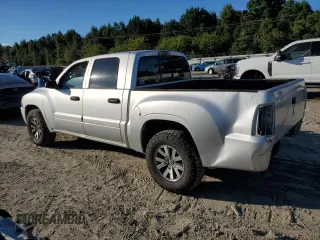2008 Mitsubishi Raider LS z VIN 1Z7HC28KX8S588361, wystawiony jako Copart lot #74239144 z przebiegiem 85 128 mil mil oraz Czysty tytuł • Clean title. Historia ofert i sprzedaży dostępna na DreamBid. Obrazek 2.