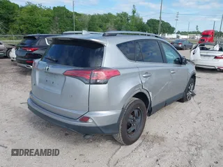 2017 Toyota RAV4 LE with VIN 2T3ZFREV2HW324895, listed as a IAAI auction lot 39150601 with 111,676 mi miles and . Bid and sale history available at carsss.com. Image 4.