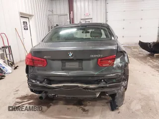 2018 BMW 3 Series 320i xDrive with VIN WBA8E5G50JNU48047, listed as a IAAI auction lot 41564022 with 69,971 mi miles. Bid and sale history available at carsss.com. Image 16.