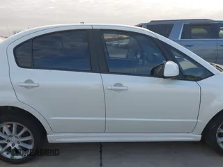 2009 Suzuki SX4 Man Sport FWD with VIN JS2YC414696201291, listed as a IAAI auction lot 41274116 with 120,233 mi miles. Bid and sale history available at carsss.com. Image 13.