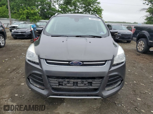 2016 Ford Escape Titanium with VIN 1FMCU9J95GUA58624, listed as a Copart auction lot 59915305 with 102,061 mi miles and Salvage title. Bid and sale history available at DreamBid. Image 5.