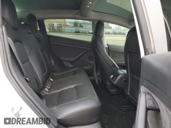 2022 Tesla Model 3 Long Range with VIN 5YJ3E1EB3NF353131, listed as a Copart auction lot 52582025 with 68,745 mi miles and Salvage Title. Bid and sale history available at carsss.com. Image 10.