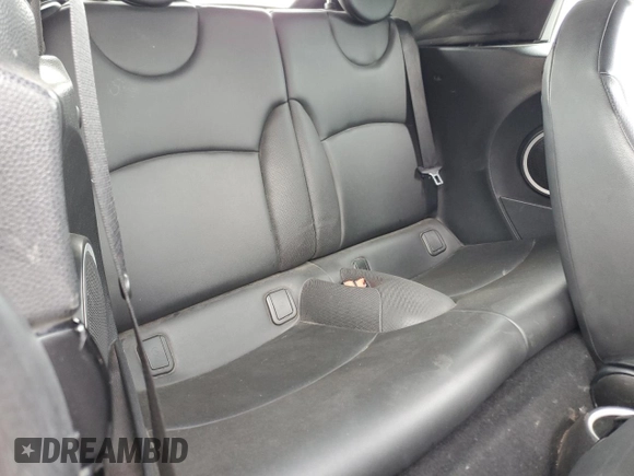 2012 MINI Convertible with VIN WMWZN3C58CT134224, listed as a Copart auction lot 57610015 with 141,394 mi miles and Salvage title. Bid and sale history available at DreamBid. Image 10.