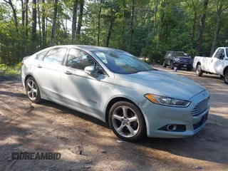 2013 Ford Fusion SE Hybrid с VIN 3FA6P0LU6DR265277, выставлен на аукционе IAAI как лот 42560242 с пробегом 186 409 миль миль и . История ставок и продаж доступна на DreamBid. Изображение 1.