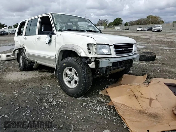 1999 Isuzu Trooper S z VIN JACDJ58XXX7922000, wystawiony jako Copart lot #48209835 z przebiegiem 127 024 mil mil oraz Szkoda całkowita • Salvage title. Historia ofert i sprzedaży dostępna na DreamBid. Obrazek 12.