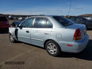 2003 Hyundai Accent GL with VIN KMHCG45C23U428132, listed as a Copart auction lot 45493875 with 0 mi miles and Salvage Title. Bid and sale history available at carsss.com. Image 2.
