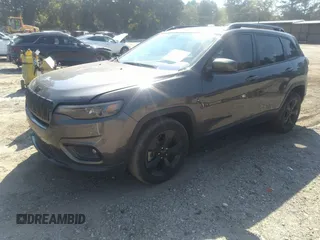 2020 Jeep Cherokee Latitude Plus with VIN 1C4PJLLB7LD581696, listed as a IAAI auction lot 40094839 with 55,576 mi miles. Bid and sale history available at carsss.com. Image 2.