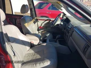 2002 Jeep Grand Cherokee Limited with VIN 1J8GX58N92C186560, listed as a IAAI auction lot 41383003 with 206,195 mi miles and . Bid and sale history available at DreamBid. Image 5.