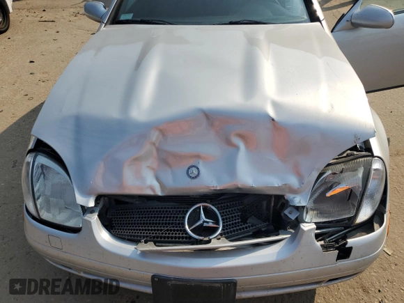 1999 Mercedes-Benz SLK-Class with VIN WDBKK47F9XF127582, listed as a Copart auction lot 71345494 with 187,302 mi miles and Salvage Title. Bid and sale history available at carsss.com. Image 11.