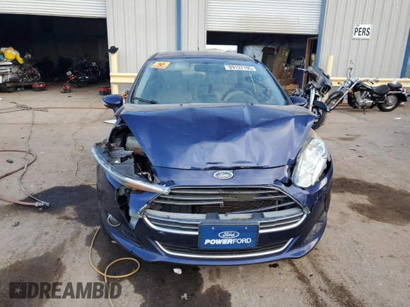 2016 Ford Fiesta Titanium z VIN 3FADP4CJ5GM175110, wystawiony jako Copart lot #89137195 z przebiegiem 129 193 mil mil oraz Szkoda całkowita • Salvage title. Historia ofert i sprzedaży dostępna na DreamBid. Obrazek 5.