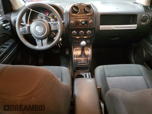 2014 Jeep Compass Sport with VIN 1C4NJDBB0ED598518, listed as a Copart auction lot 55072665 with 128,141 mi miles and Salvage Title. Bid and sale history available at carsss.com. Image 8.