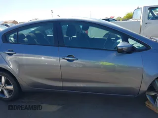 2018 Kia Forte LX with VIN 3KPFL4A77JE220538, listed as a IAAI auction lot 42095964 with 98,977 mi miles and . Bid and sale history available at DreamBid. Image 13.