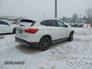 2018 BMW X1 xDrive28i with VIN WBXHT3C33J3H29973, listed as a IAAI auction lot 41547866 with 1 mi miles. Bid and sale history available at carsss.com. Image 4.