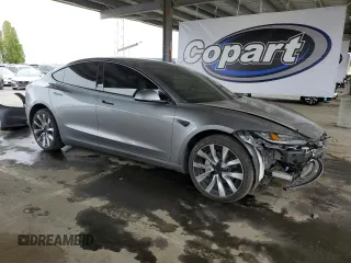 2024 Tesla Model 3 z VIN 5YJ3E1EA0RF859934, wystawiony jako Copart lot #52962285 z przebiegiem 32 329 mil mil oraz Szkoda całkowita • Salvage title. Historia ofert i sprzedaży dostępna na DreamBid. Obrazek 4.
