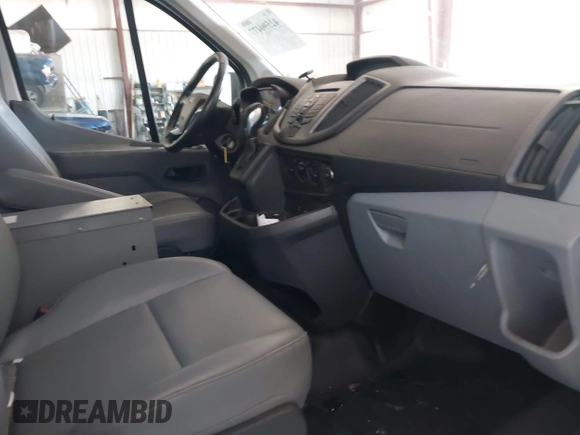 2016 Ford Transit Cargo z VIN 1FTYR2ZM6GKA03946, wystawiony jako IAAI lot #42590477 z przebiegiem 163 710 mil mil oraz . Historia ofert i sprzedaży dostępna na DreamBid. Obrazek 5.