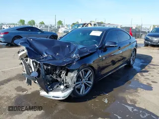 2015 BMW 4 Series 435i with VIN WBA4B1C54FD418309, listed as a IAAI auction lot 42099401 with 119,982 mi miles and . Bid and sale history available at carsss.com. Image 2.